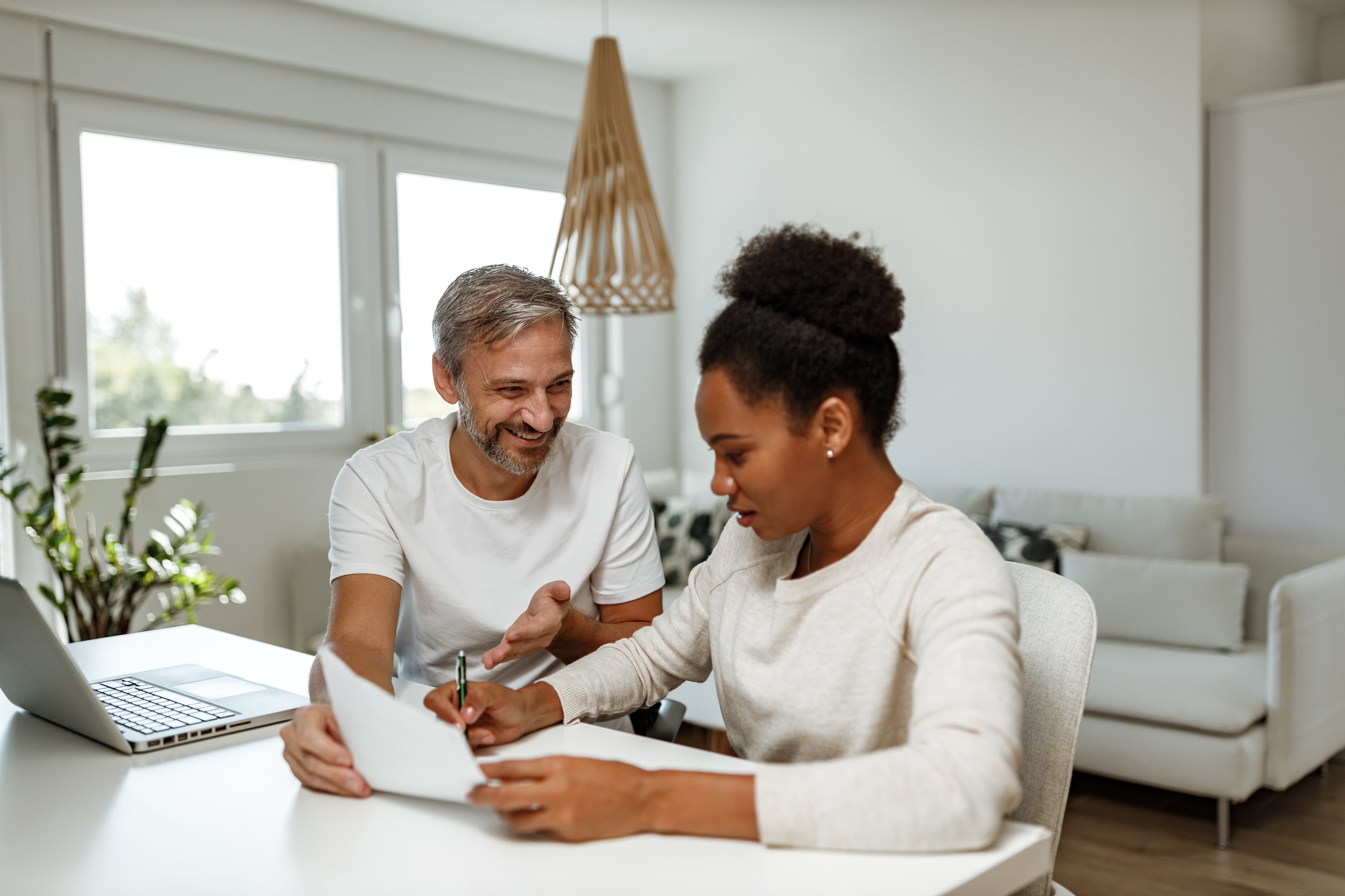 Man and woman reviewing financial plan